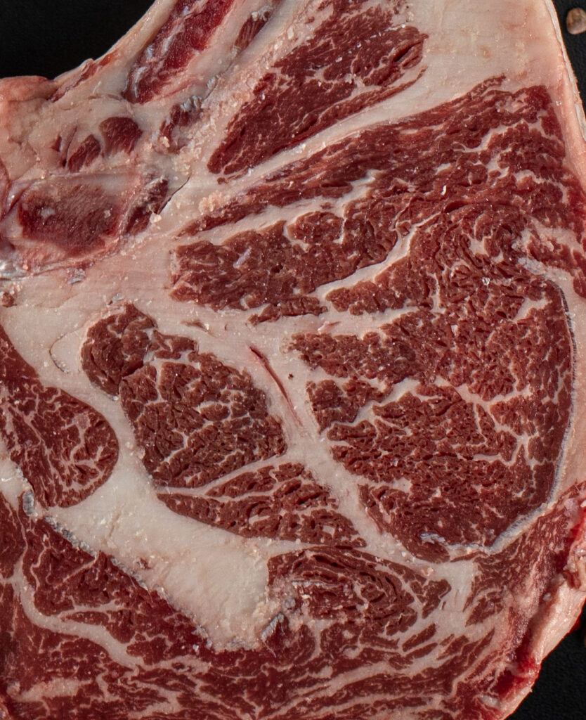 Tomahawk Steak, Black Angus · MB3+, Marbling close-up